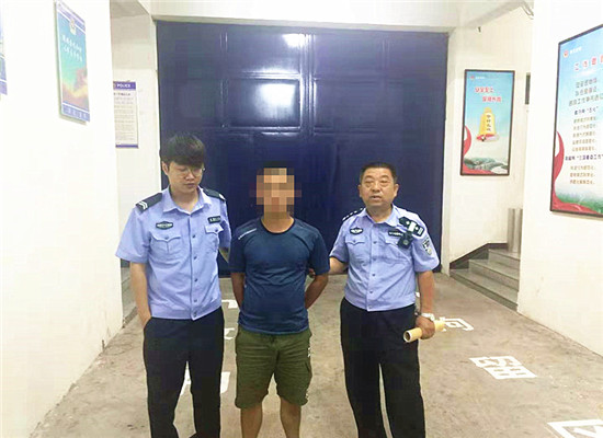 男子被依法行政拘留  通讯员 杨娇 摄.JPG